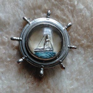 Essex style reverse carved sailboat brooch
